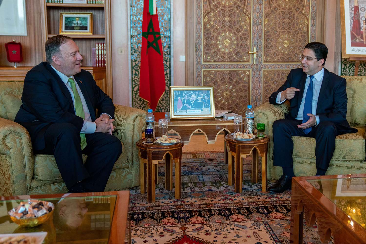US Secretary of State Mike Pompeo (L) speaks with Moroccan Foreign Minister Nasser Bourita during their meeting