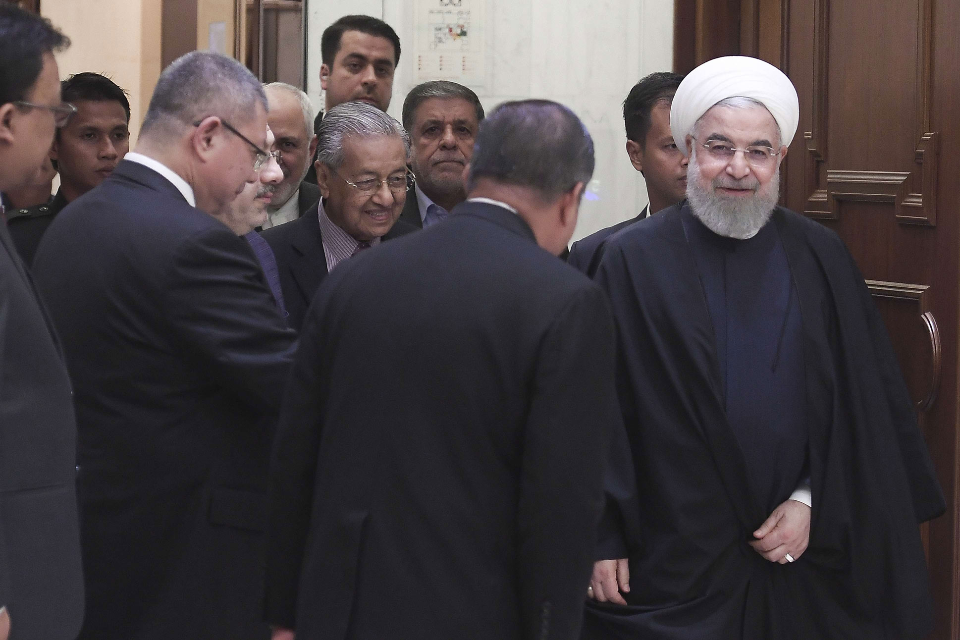 روحاني يشارك إلى جانب أمير قطر الشيخ تميم والرئيس التركي رجب طيب أردوغان في قمة كوالالمبور