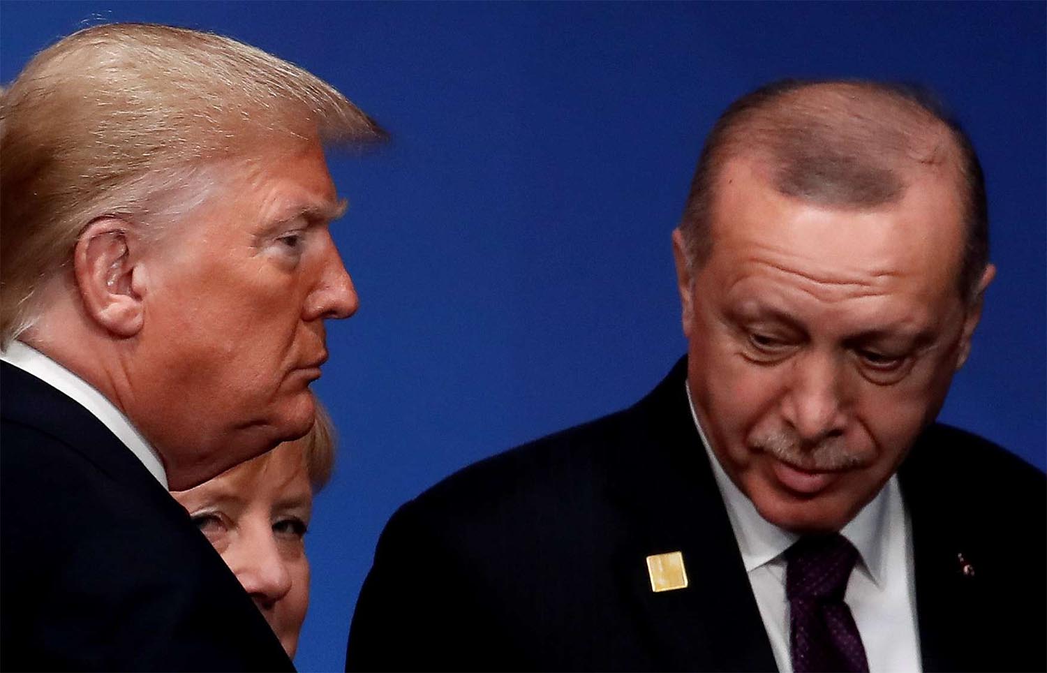 US President Donald Trump, Turkey's President Tayyip Erdogan and Germany's Chancellor Angela Merkel a