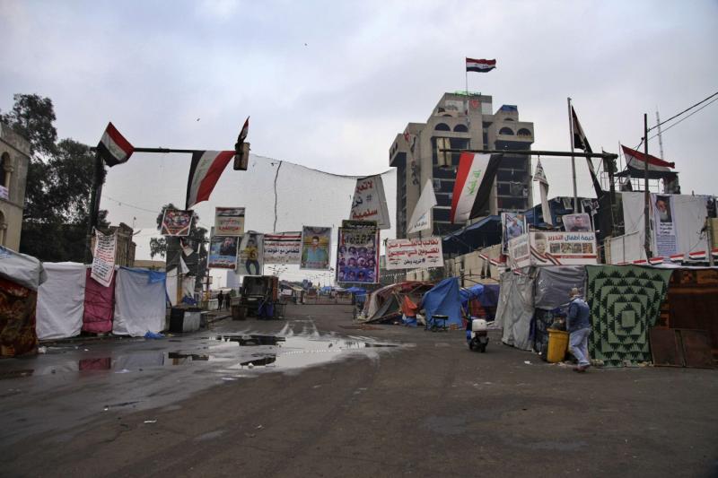 Posters of anti-government protesters who have been killed in demonstrations are displayed in Tahrir Square 