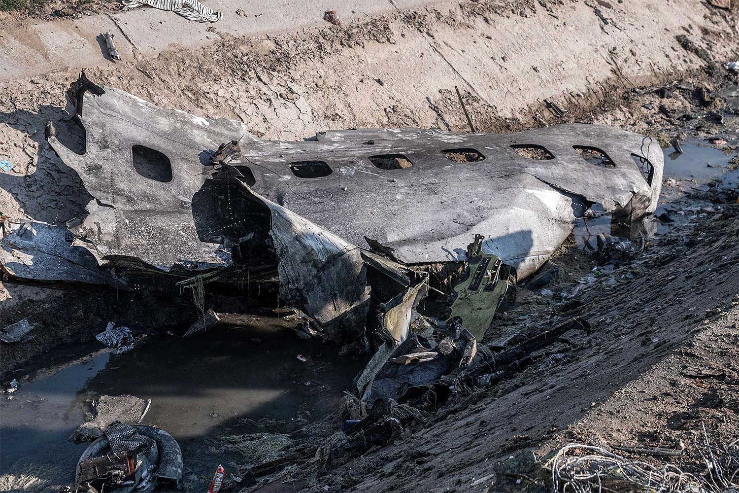 A piece of airplane fuselage at the scene of the crash