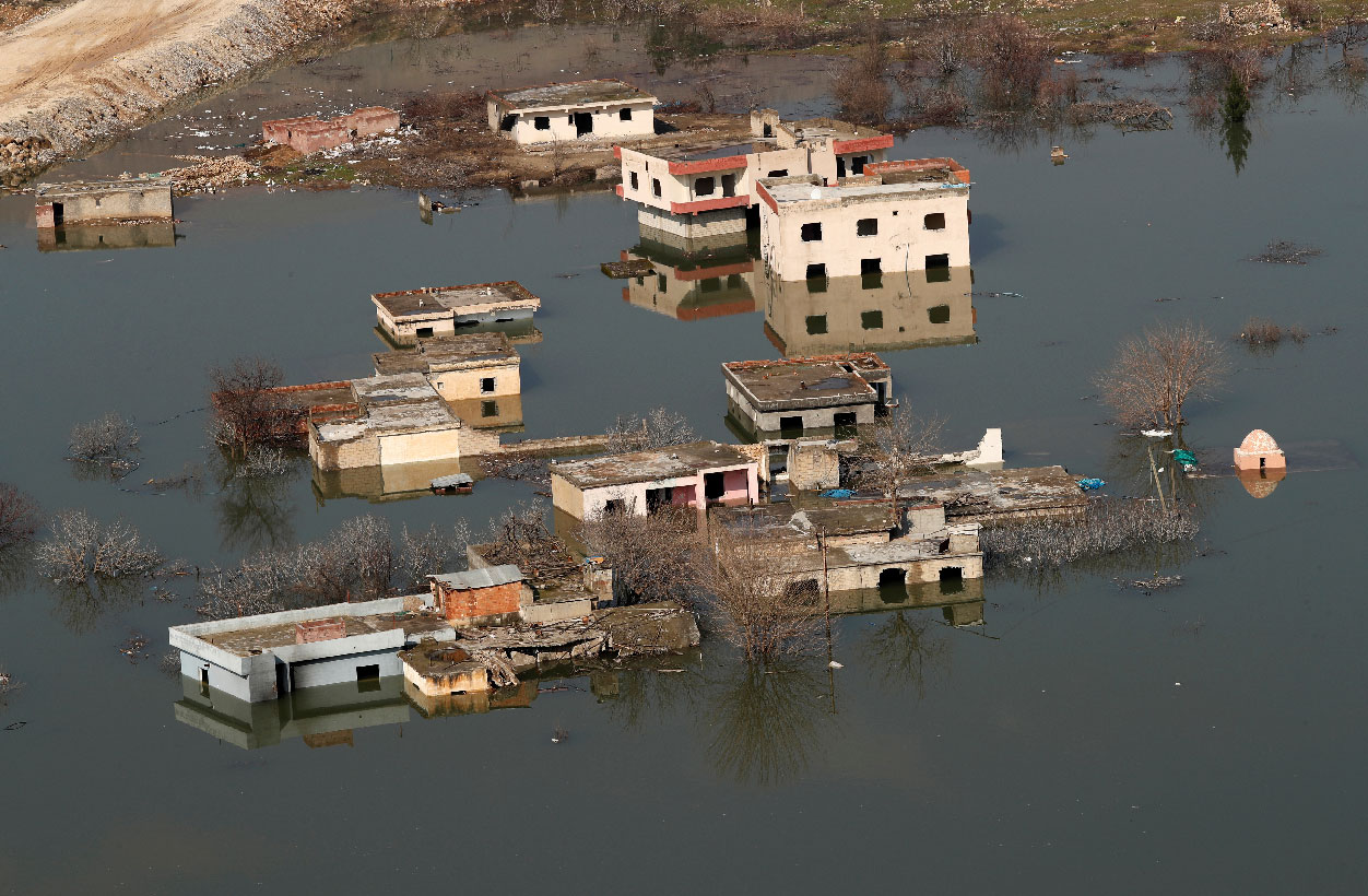 Houses submerged by the rising waters of the Tigris River are seen in Hasankeyf