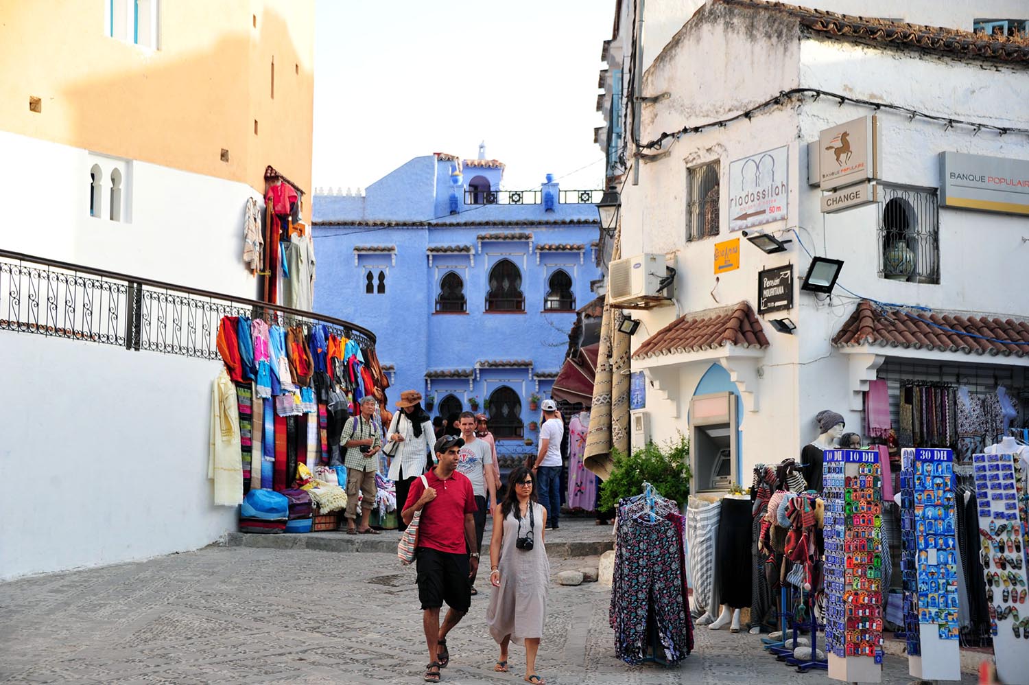 Tourists wandering in the streets of Chefchaouen