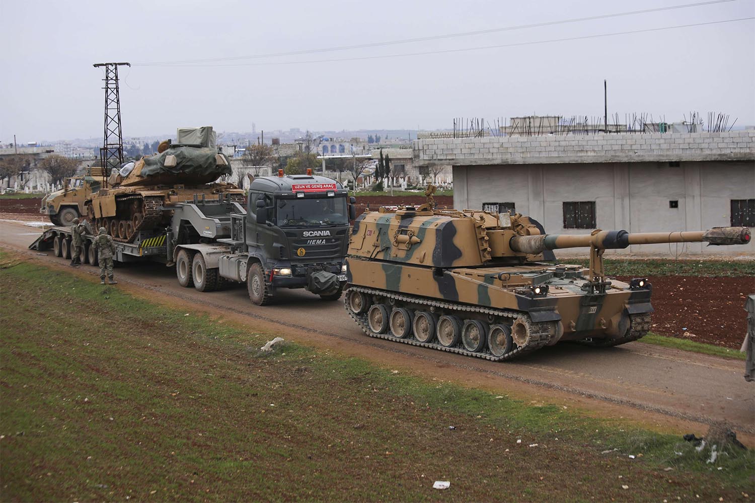 Turkish military convoy is seen near the town of Idlib