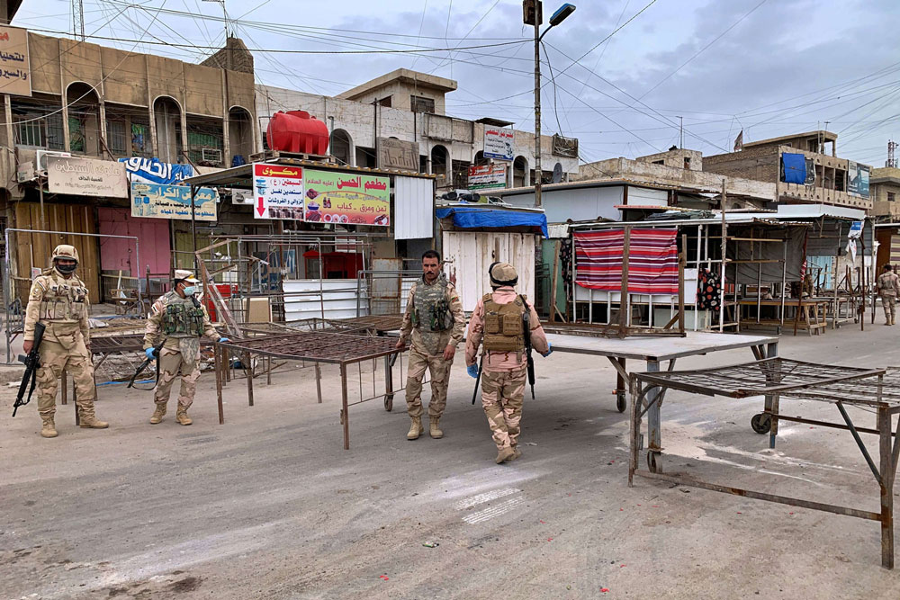 قوات الأمن العراقية تحظر التجوال خوفا من تفشي كورونا
