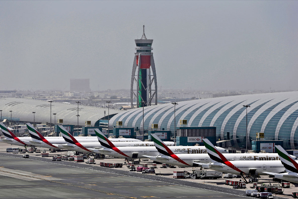 Emirates planes parked at the Dubai International Airport