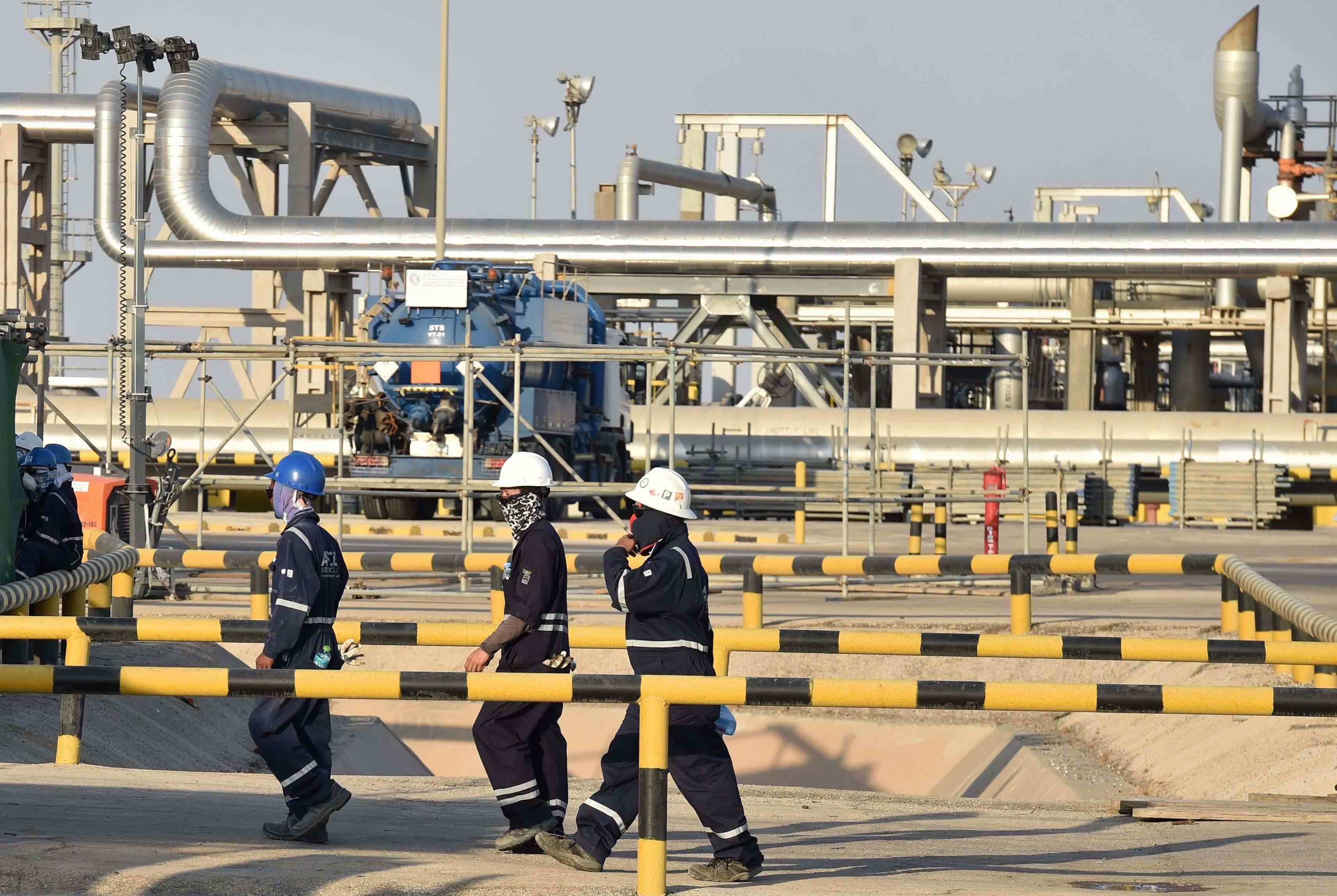 Employees of Aramco oil company at Saudi Arabia’s Abqaiq oil processing plant