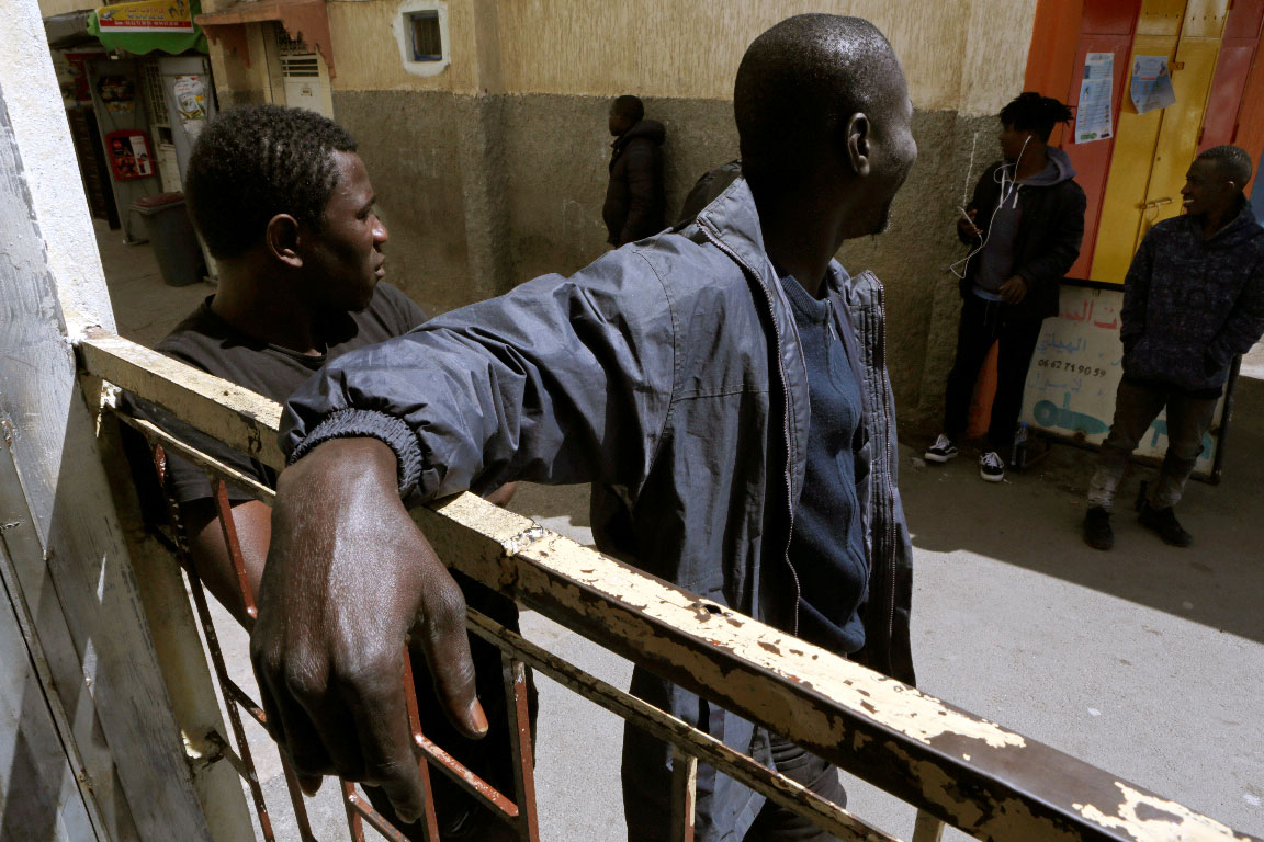 African migrants pictured during a lockdown to contain the spread of the coronavirus disease, on the outskirts of Rabat