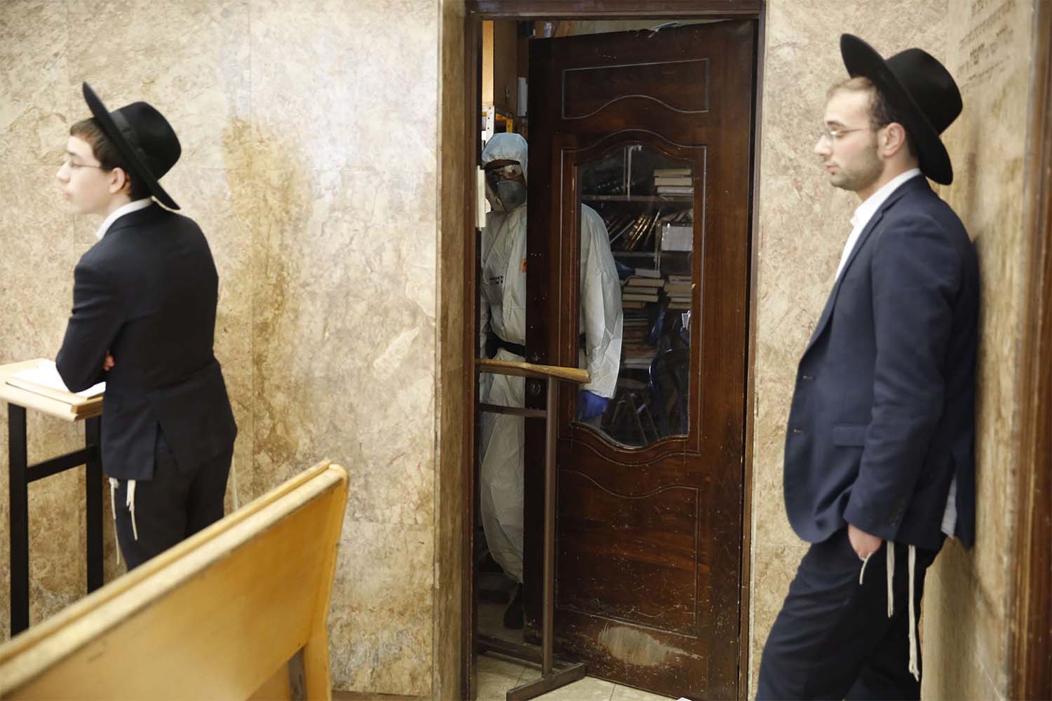 Ultra-Orthodox men pray in a synagogue 
