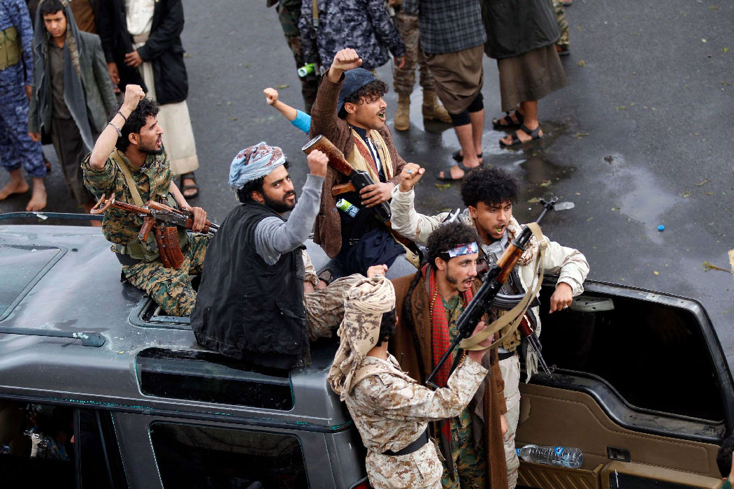 Yemeni Huthi rebels take part in a demonstration