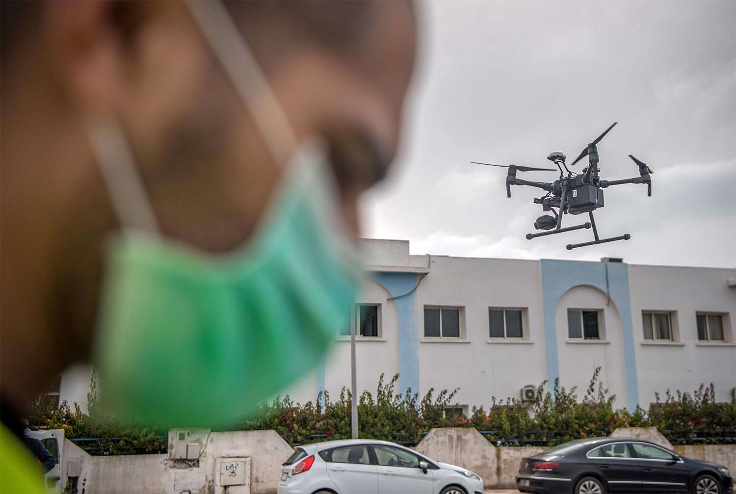 Flying drone equipped with a thermal camera in a street of Harhoura near Rabat