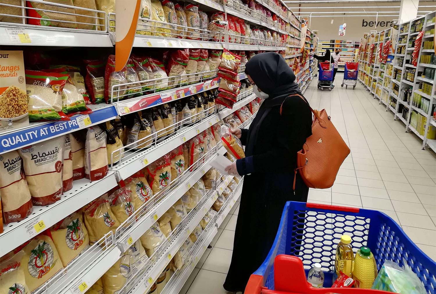 people shopping at a supermarket in the Saudi capital Riyadh