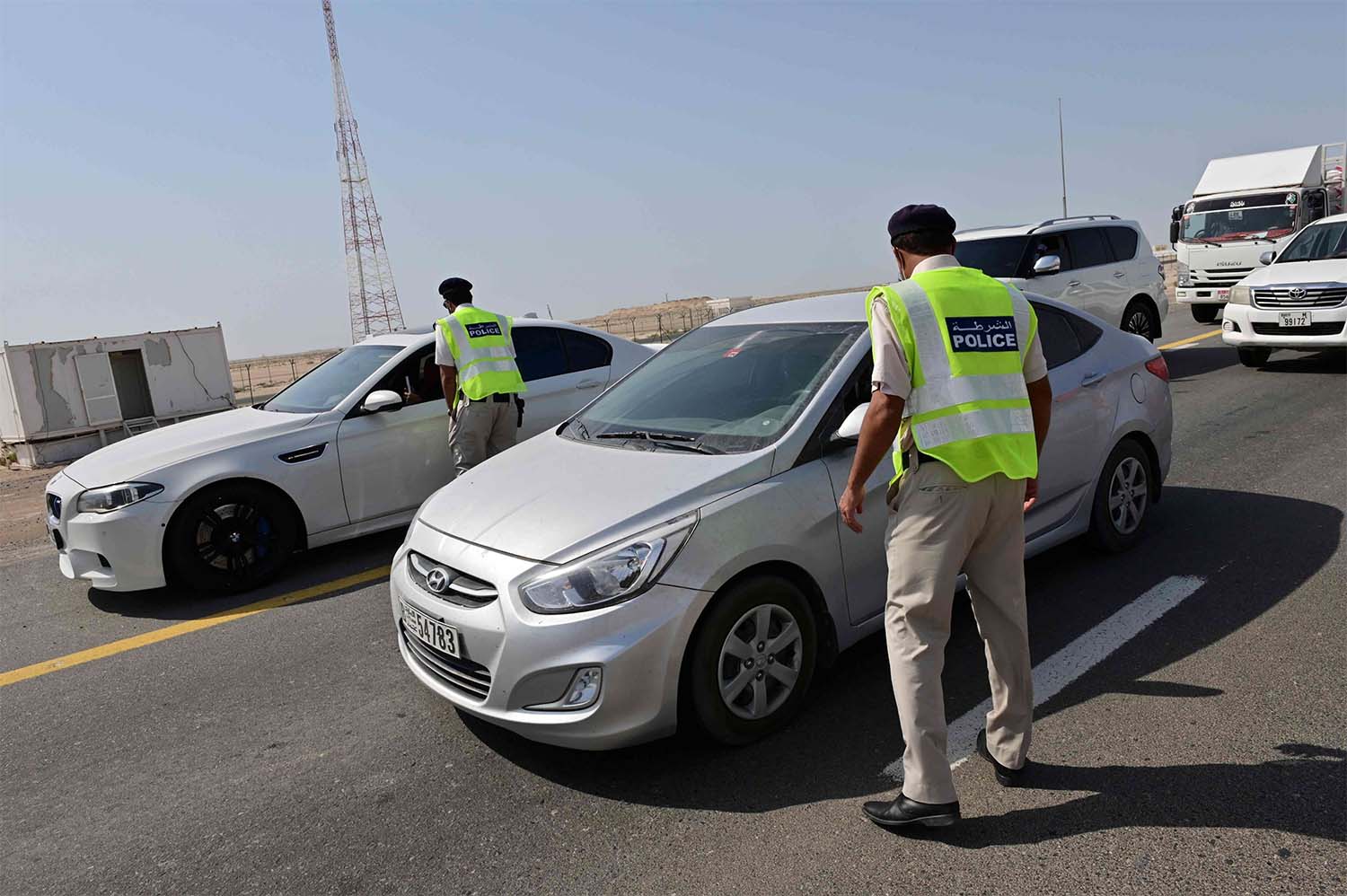 mirati security forces man a checkpoint at the entrance of Abu Dhabi