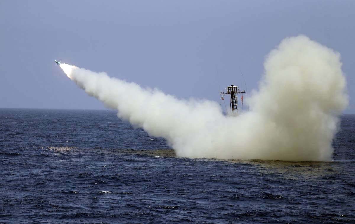 Iranian warship launches a missile during a naval exercise