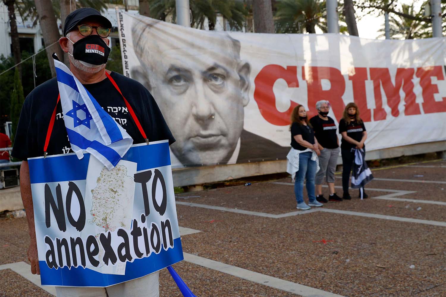 Protesters gather in Tel Aviv's Rabin Square on June 6, 2020, to denounce Israel's plan to annex parts of the occupied West Bank