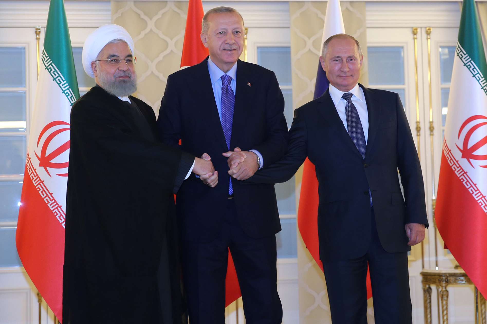 رؤساء روسيا وتركيا وإيران في لقاء سابق