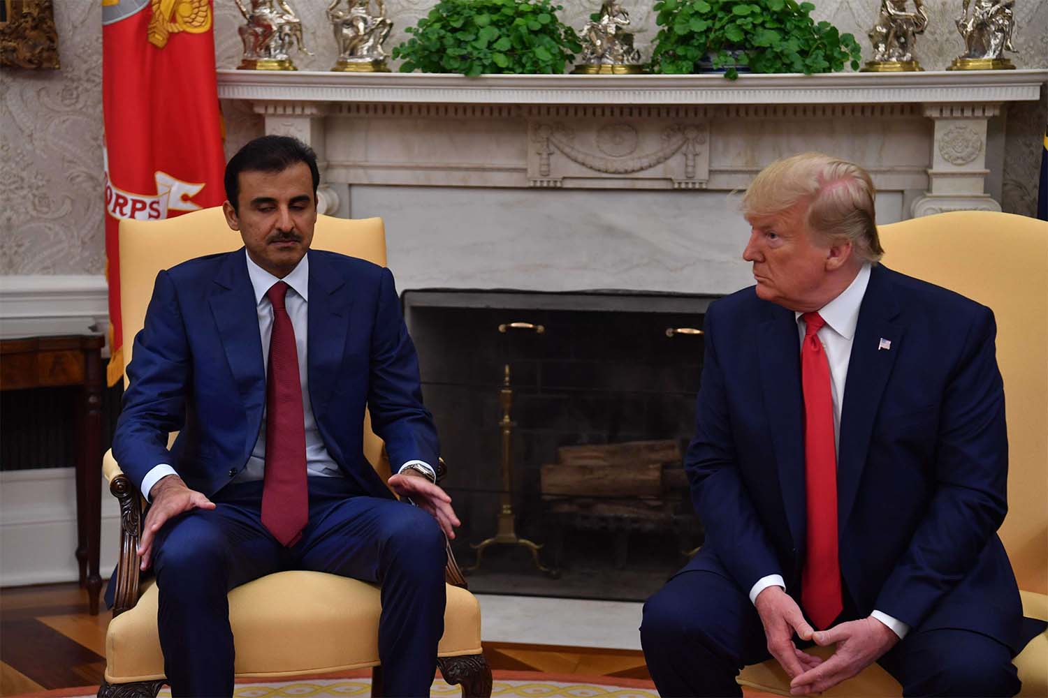 US President Donald Trump meeting with the Emir of Qatar Sheikh Tamim bin Hamad al-Thani in the Oval Office at the White House in Washington