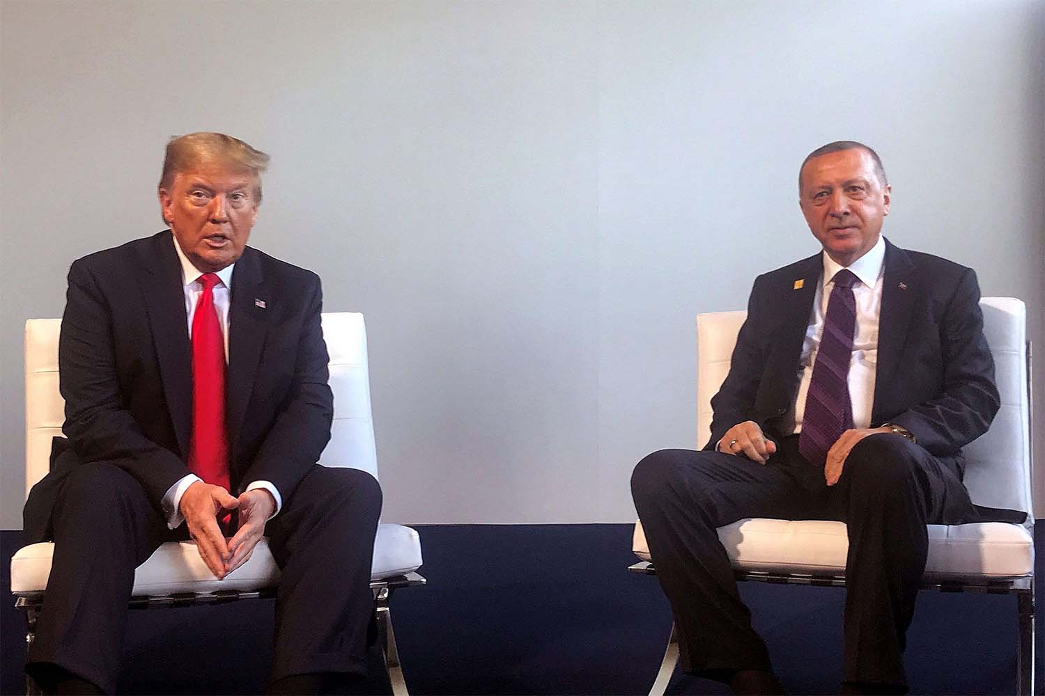 Turkey's President Recep Tayyip Erdogan (R) and US President Donald Trump (L) 