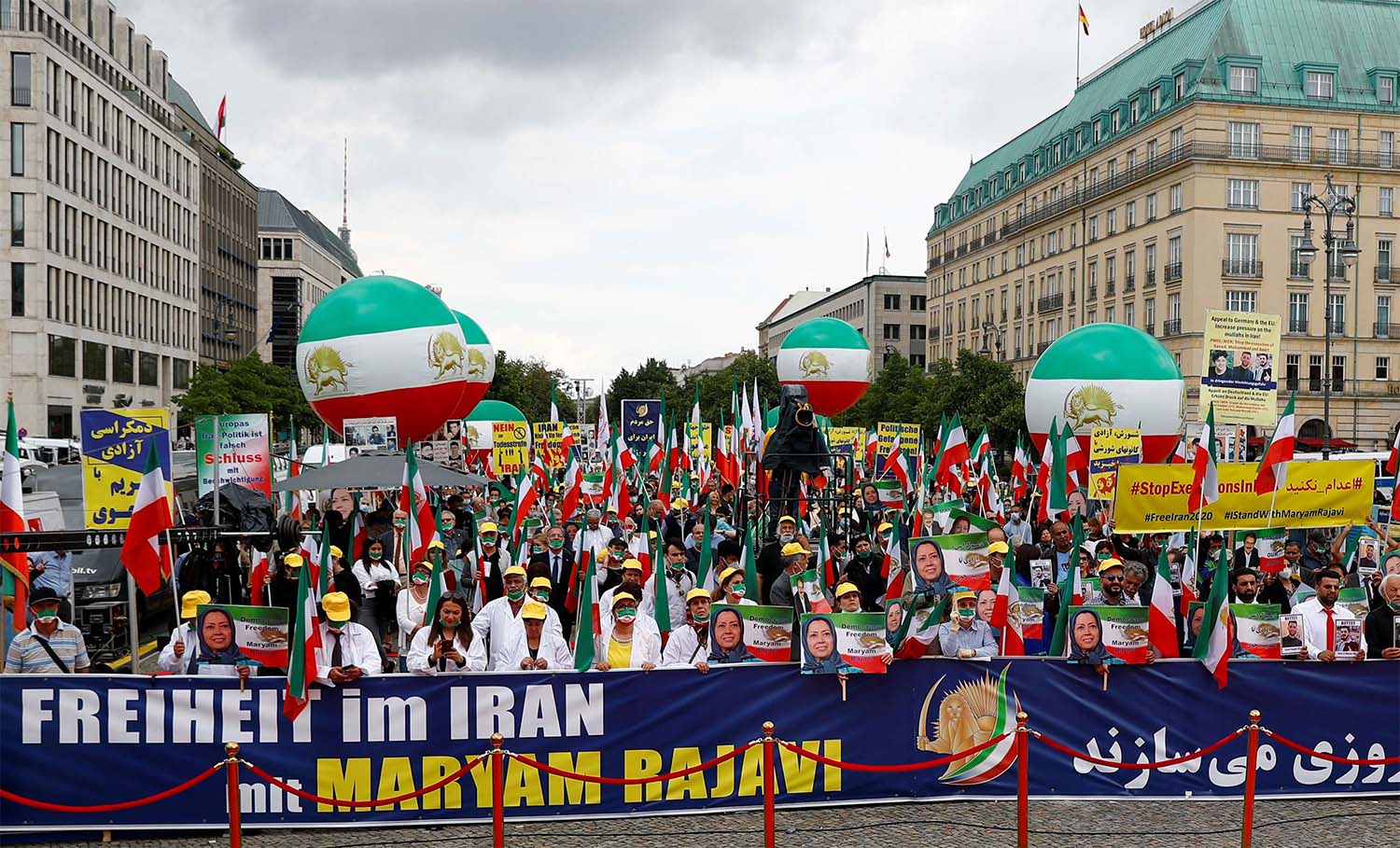 Supporters of Iranian opposition leader Maryam Rajavi and the National Council of Resistance of Iran (NCRI) gather to protest against the death penalty in Iran