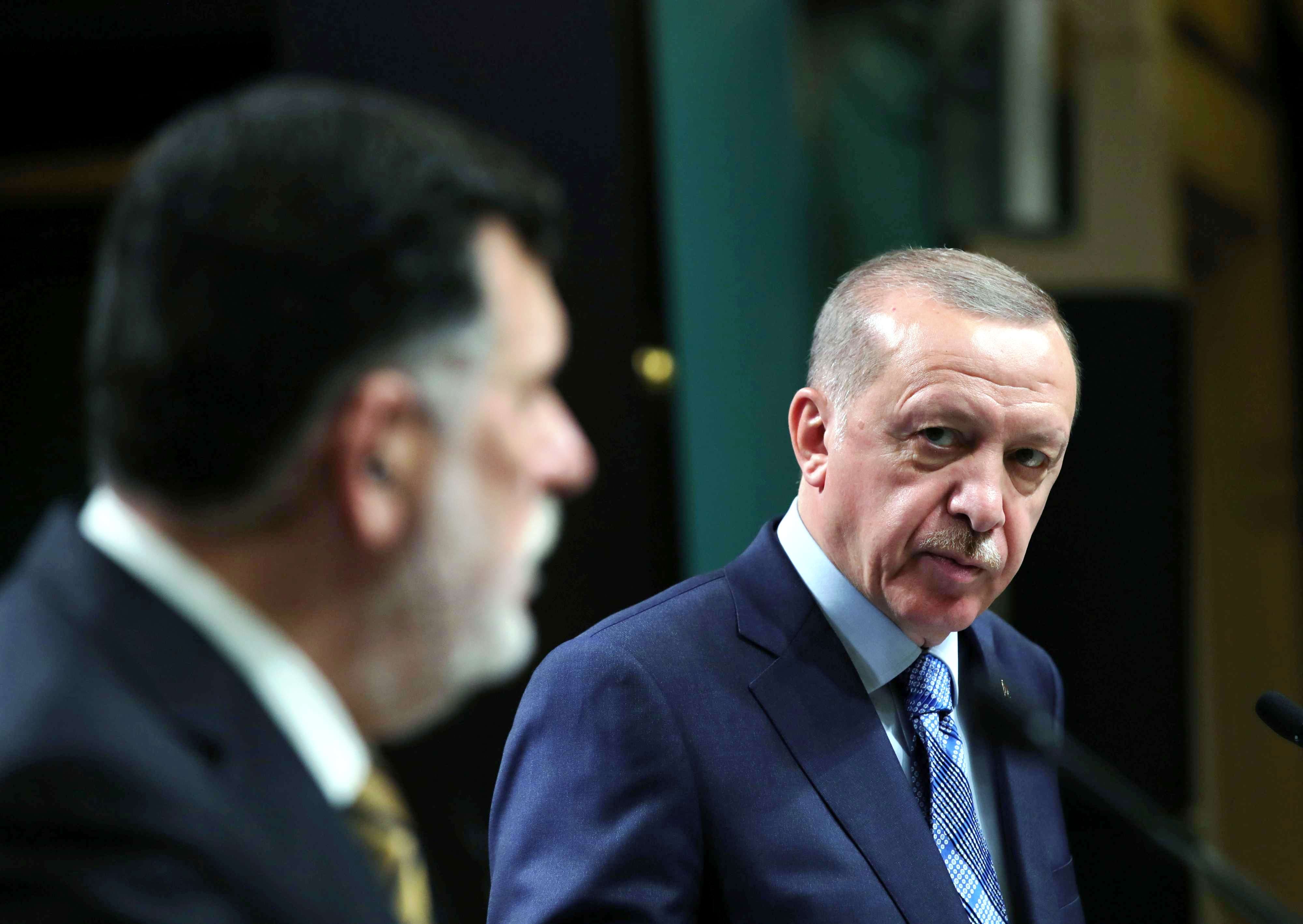 الرئيس التركي رجب طيب أردوغان ورئيس حكومة الوفاق فايز السراج