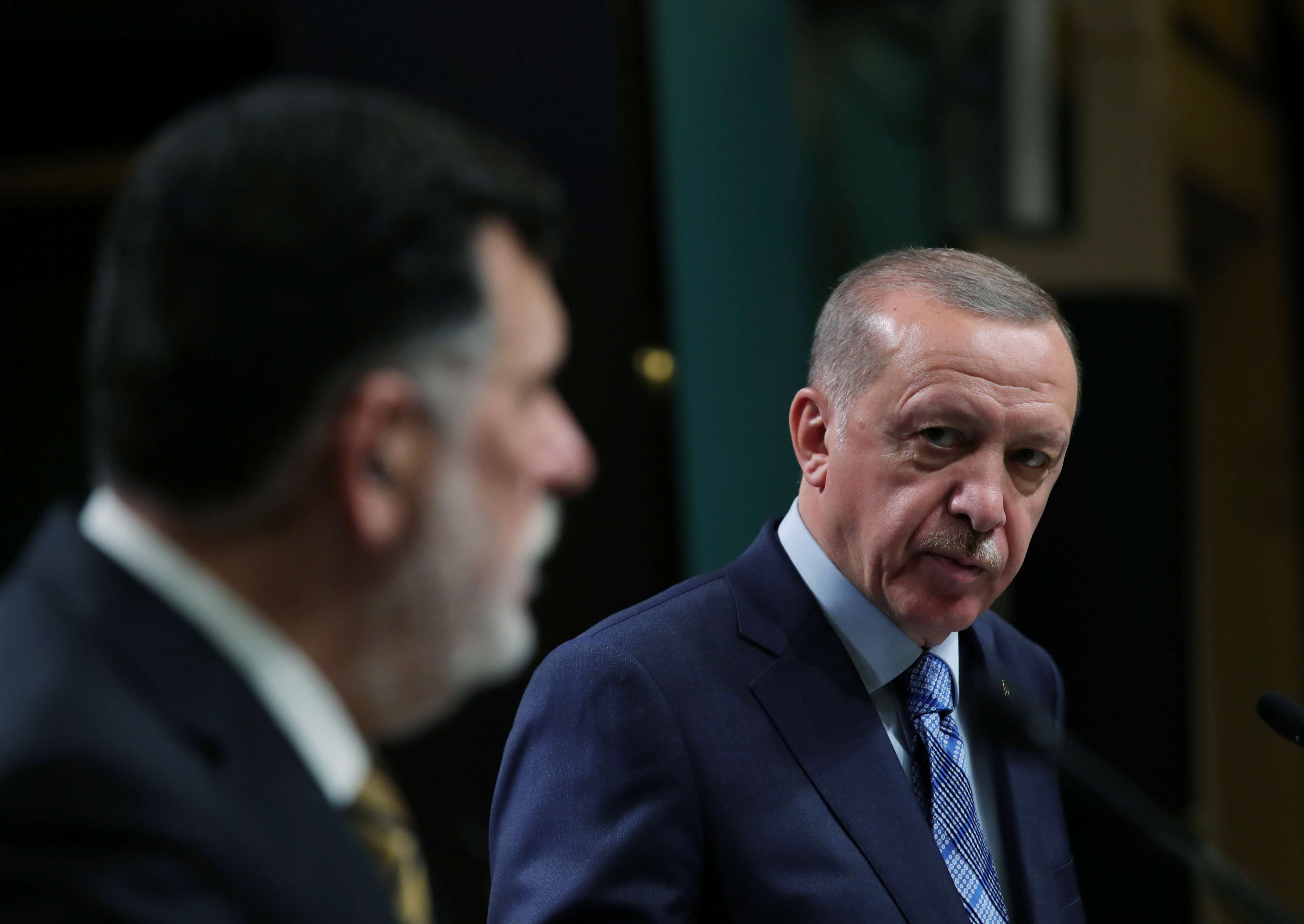 الرئيس التركي رجب طيب اردوغان ورئيس حكومة الوفاق فائز السراج