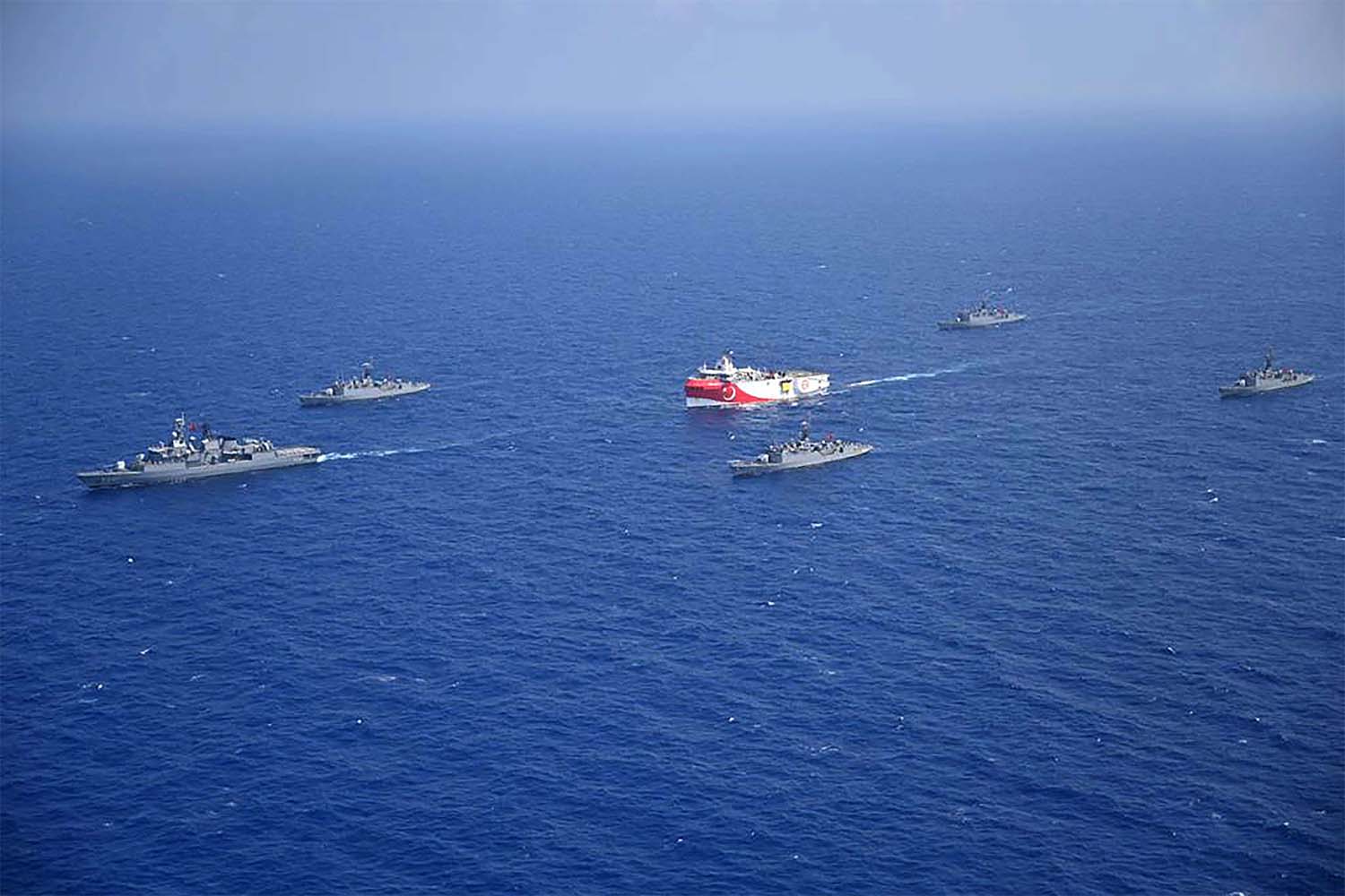 Turkish seismic research vessel 'Oruc Reis' (C) as it is escorted by Turkish Naval ships in the Mediterranean