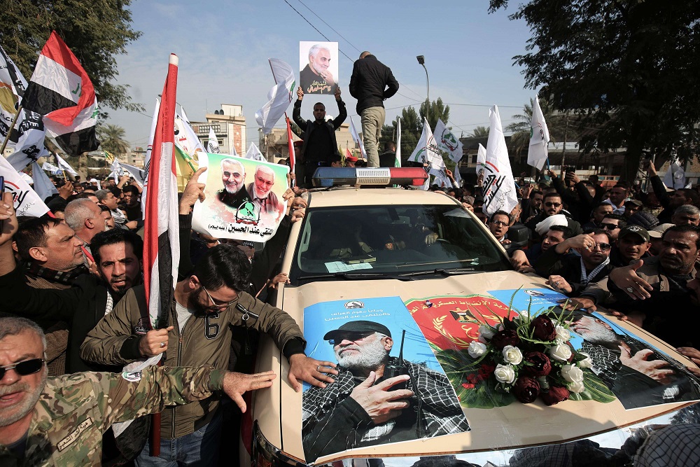 مظاهرة لأنصار الحشد الشعبي ببغداد في الذكرى الأولى لوفاة سليماني والمهندس