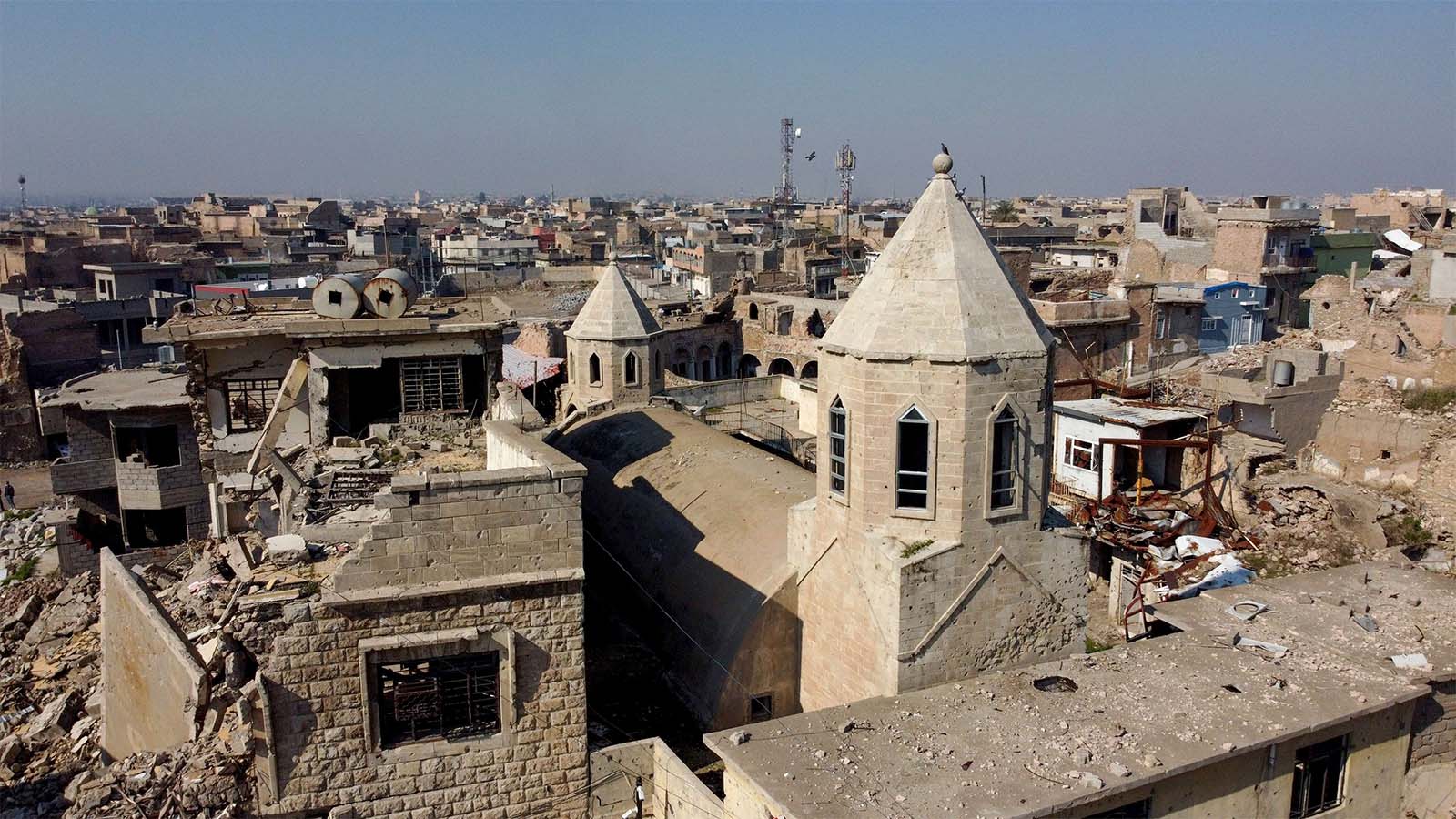 A view of the old city of Mosul and buildings destroyed during past fighting with Islamic State militants