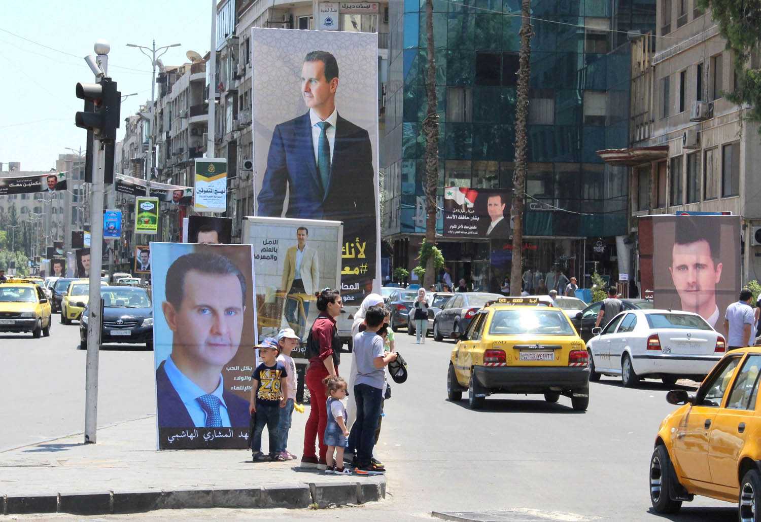 صور الرئيس السوري بشار الأسد في دمشق