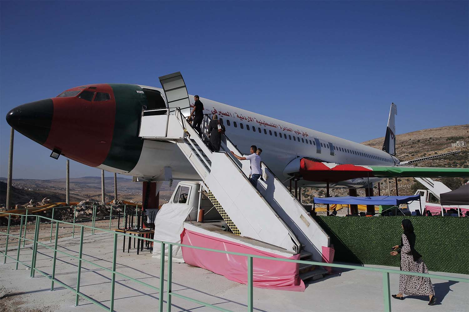Many visitors come to take photos inside the plane at a price of five shekels (about $1.50) per person