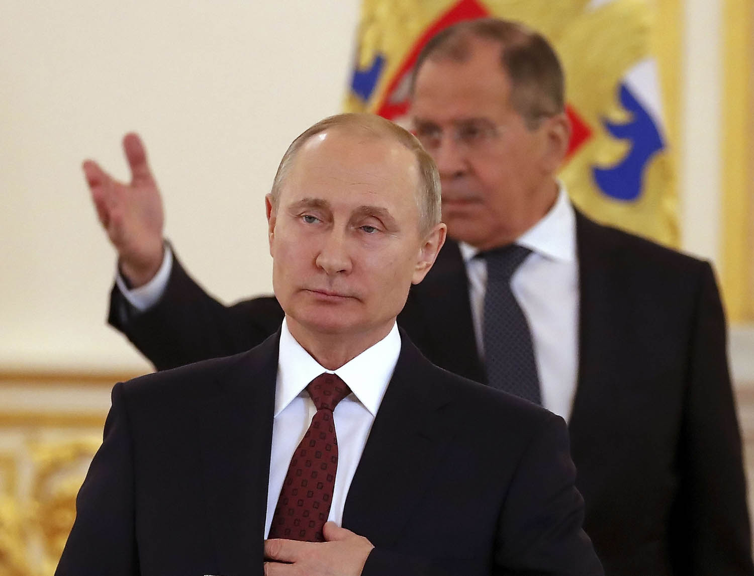 الرئيس الروسي فلاديمير بوتين ووزير الخارجية سيرغي لافروف