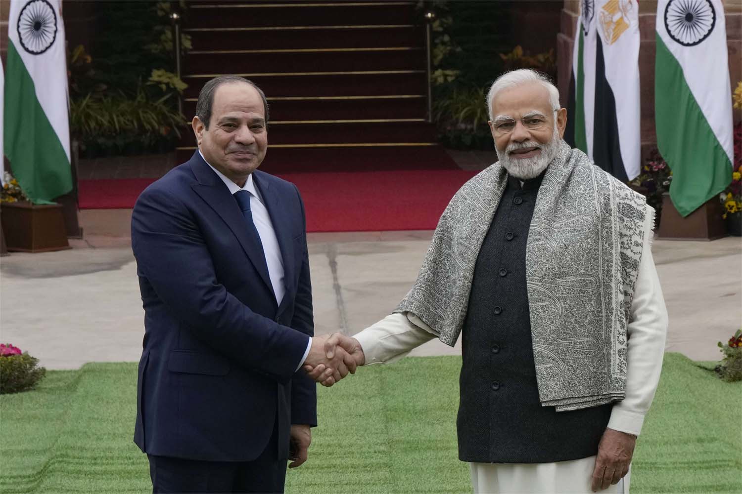 Indian PM Narendra Modi shakes hand with Egyptian President Abdel Fattah Al-Sisi
