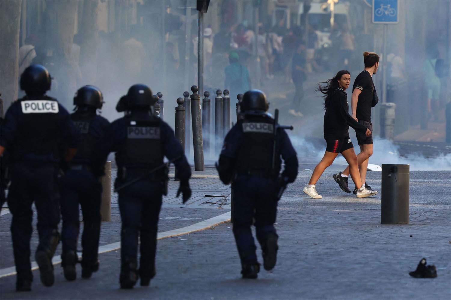 Three of the 45,000 police officers deployed overnight were injured