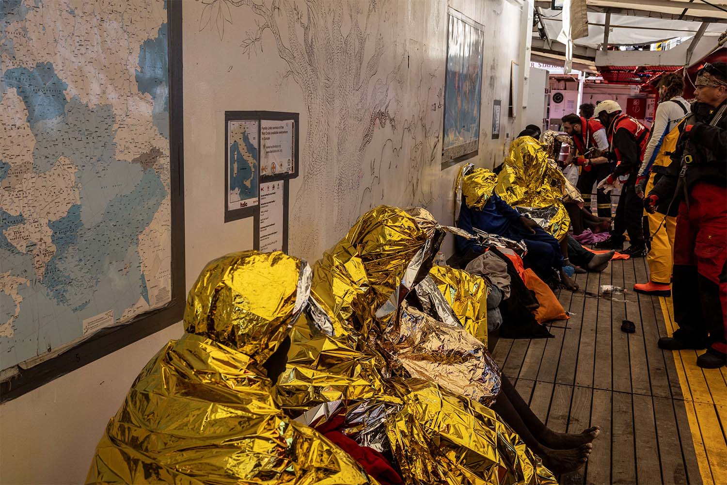 Migrants rest onboard the rescue ship Ocean Viking run by NGO SOS Mediterranee