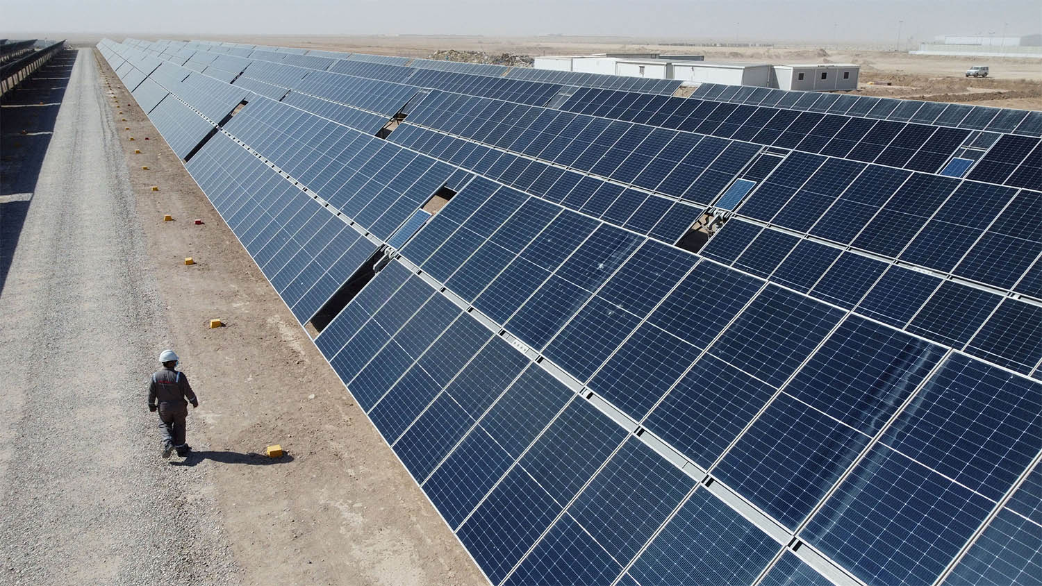 A general view shows solar panels at the Faihaa oil field in Basra