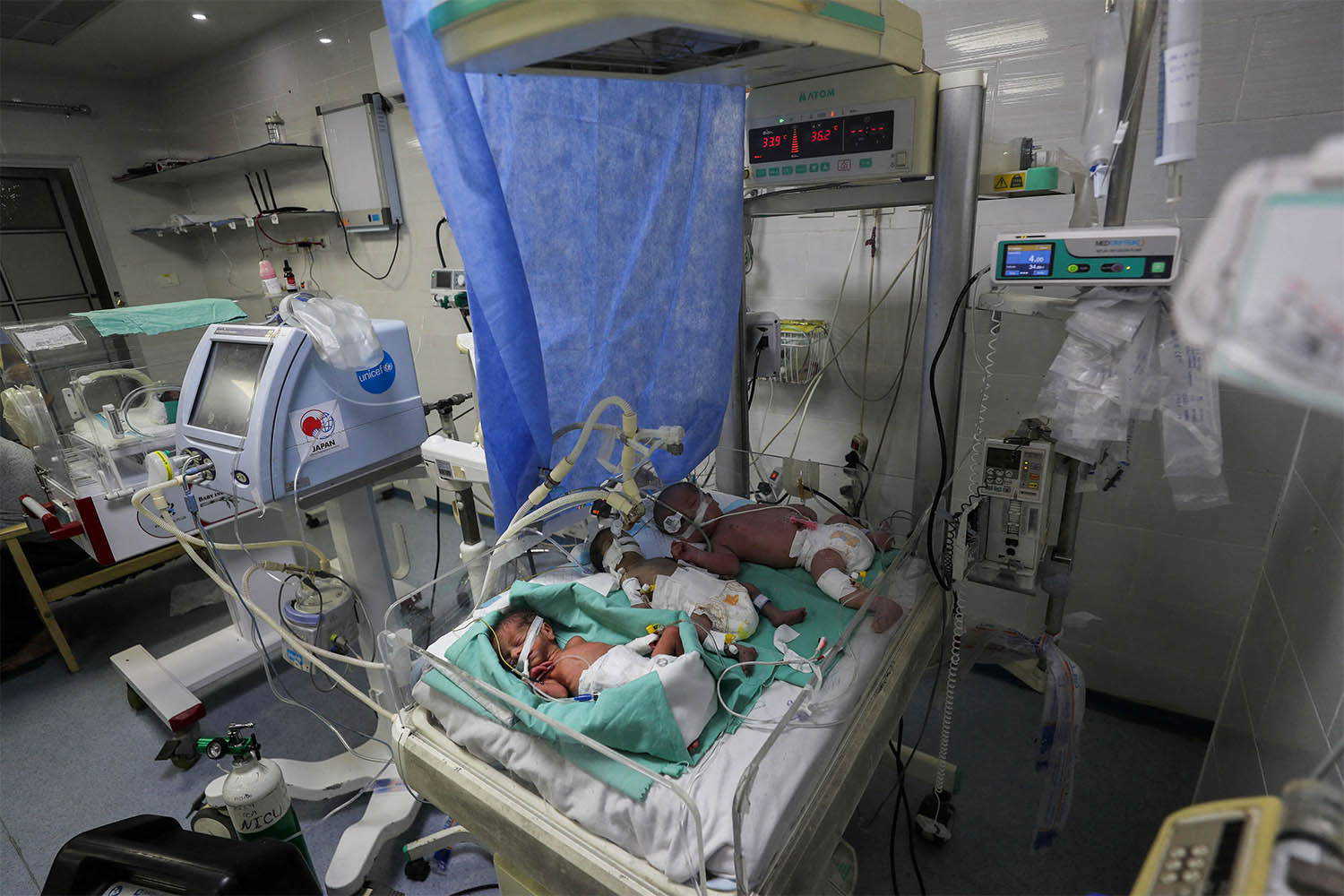 Palestinian newborns share an incubator at Al-Helou hospital due to fuel crisis