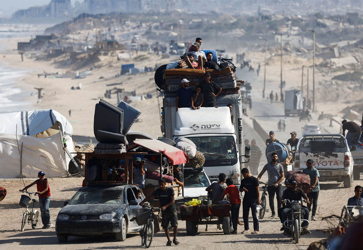 Displaced Palestinians fleeing northern Gaza due to an Israeli military operation