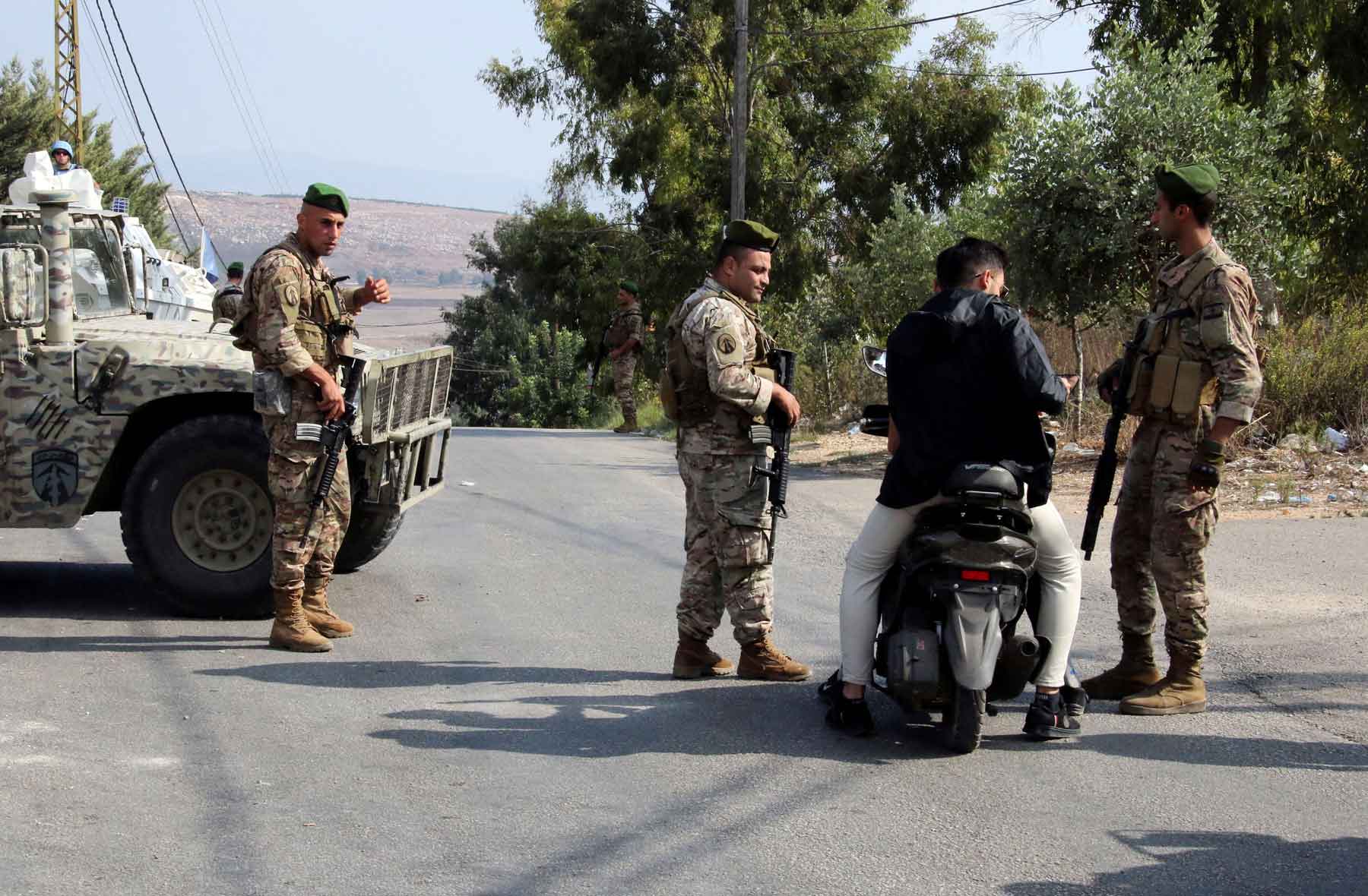 Lebanese army members man a checkpoint in Marjayoun, near the border with Israel, in southern Lebanon. 