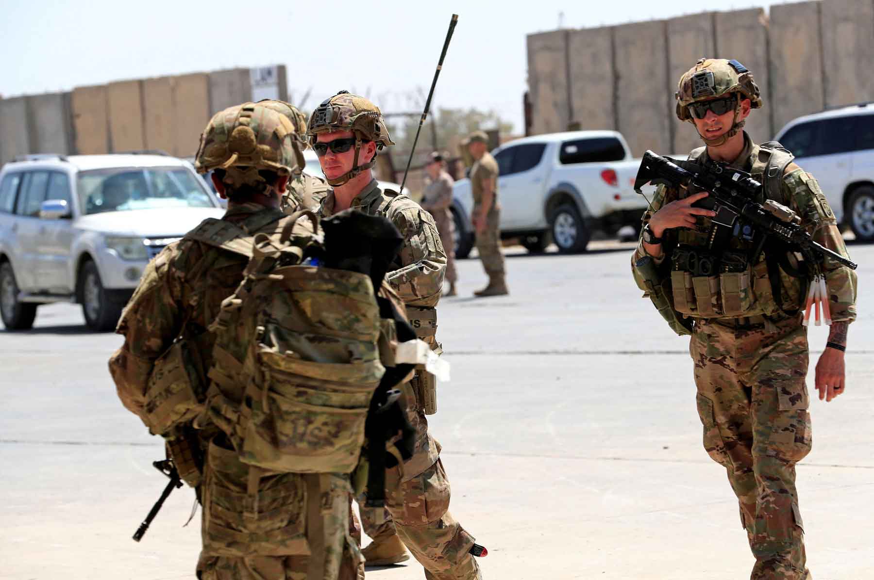 US soldiers are seen during a handover ceremony of Taji military base from US-led coalition troops to Iraqi security forces, in the base north of Baghdad, August 23, 2020. 