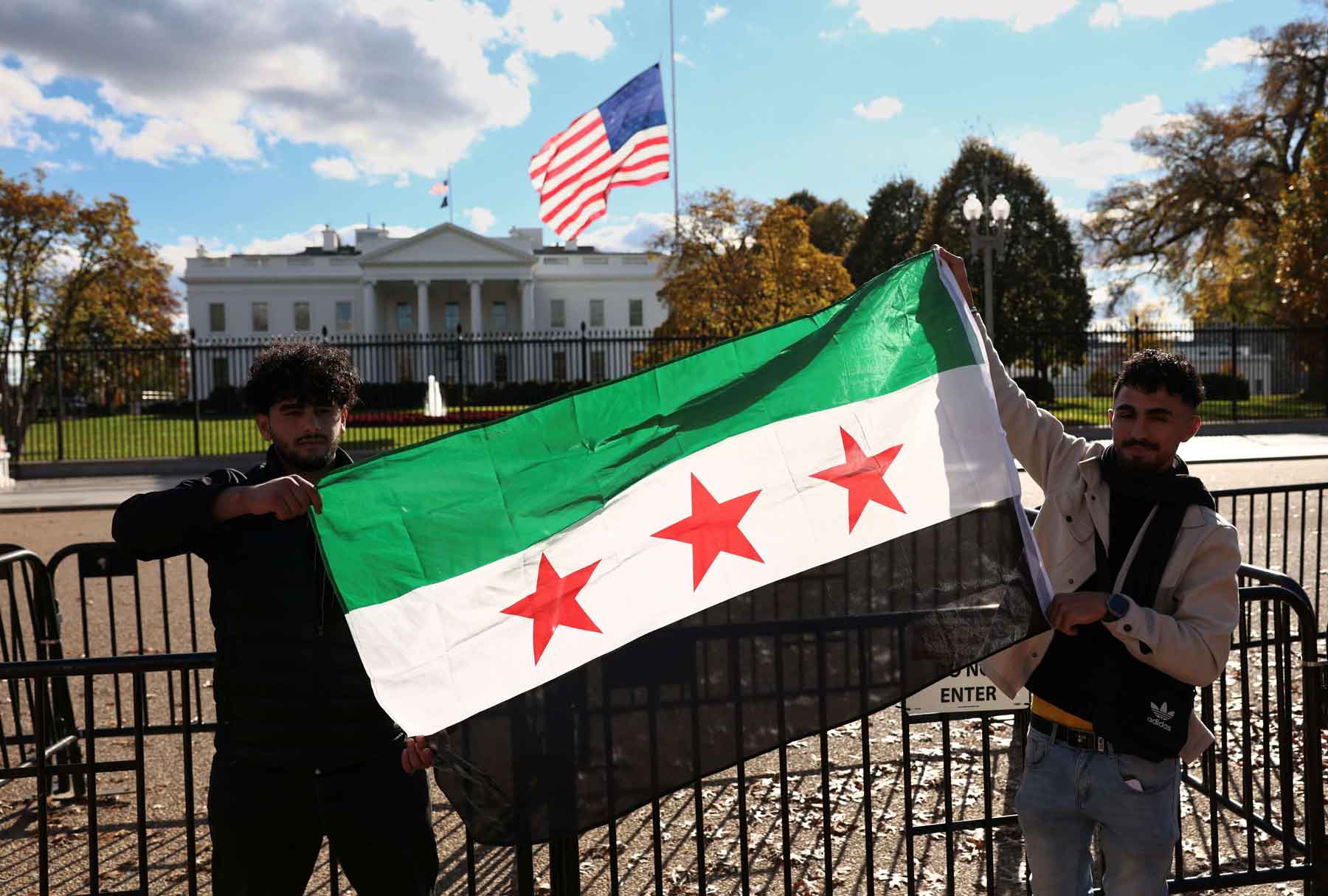 Dr. Suzan Amedi  A Syrian flag is displayed outside the White House following the meeting of US President Donald Trump and Syrian President Ahmed al-Sharaa in the Oval Office of the White House in Washington, November 10, 2025. 
