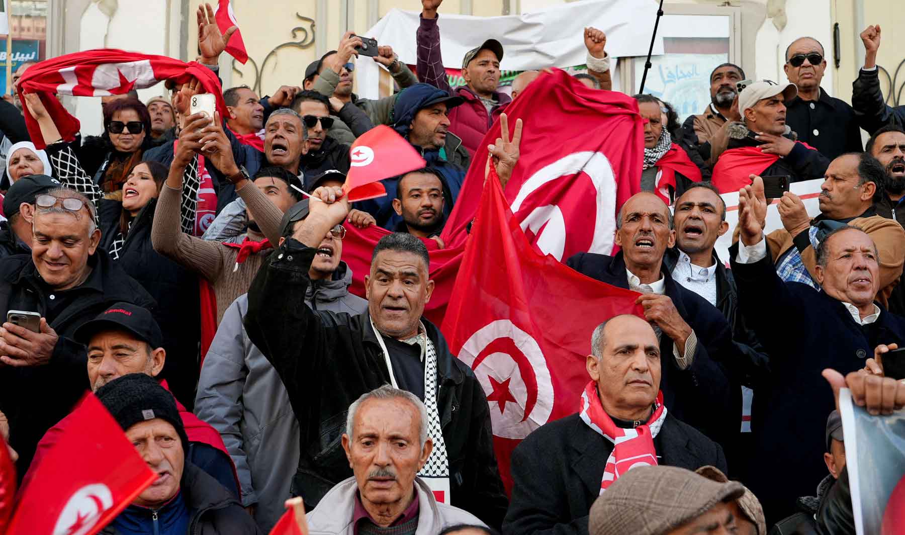 Supporters of Tunisian President Kais Saied rally in Tunis, December 17, 2025. 