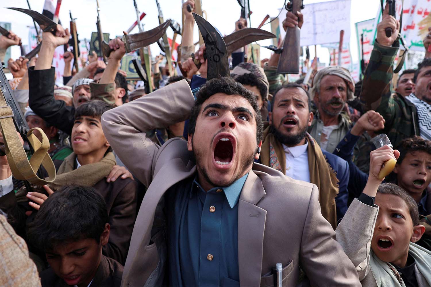 Houthi supporters shout slogans during a pro-Palestinian rally one day after Israeli airstrikes in Sanaa last September