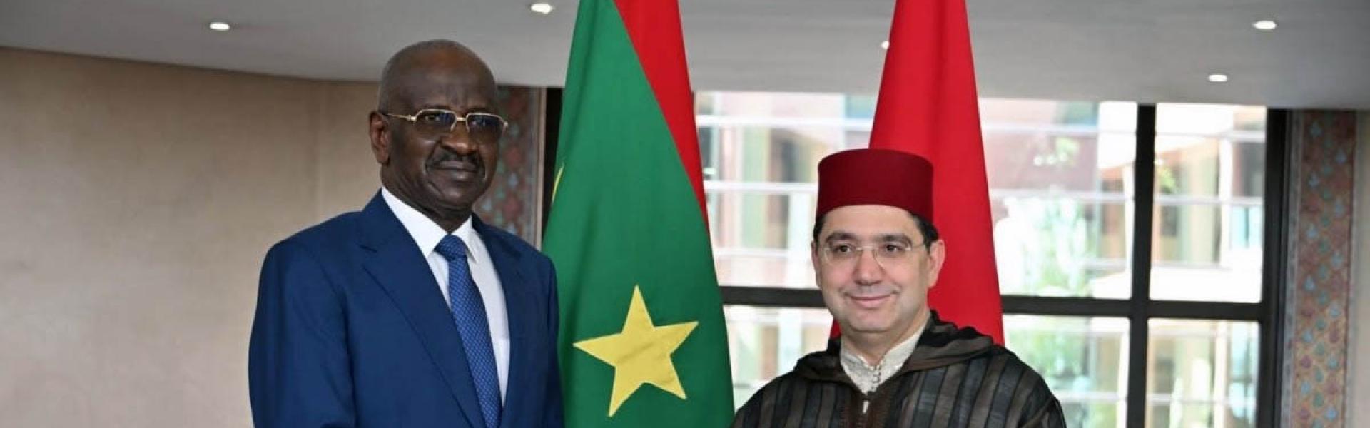 Ould Merzoug shaking hands with Bourita at Morocco's foreign ministry