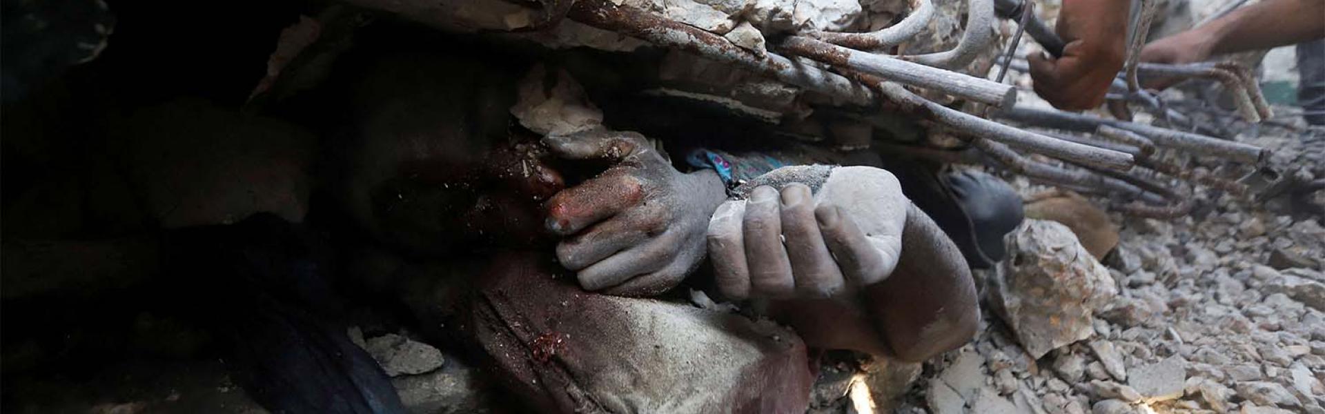 USAID staff reported seeing a human femur and other bones on the roads, dead bodies abandoned in cars