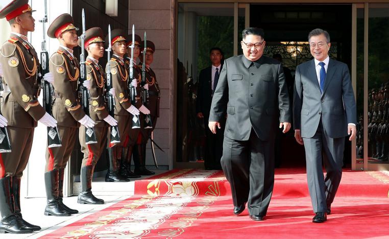 زعيما الكوريتين كيم جونغ-اون ومون جاي-إن 