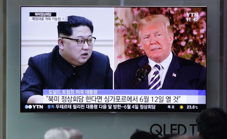 كيم وترامب على شاشة تلفاز