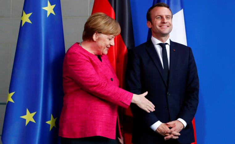 الرئيس الفرنسي امانويل ماكرون والمستشارة الألمانية أنغيلا ميركل
