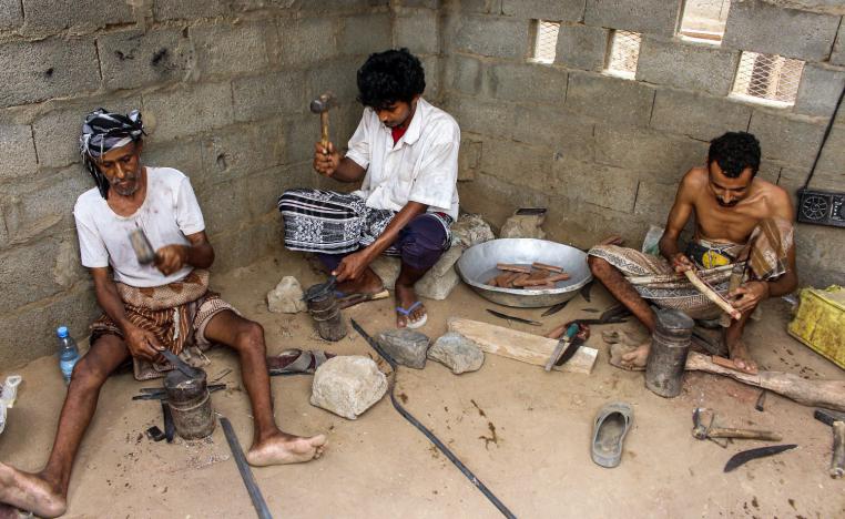 Yemenis hammer blades reformed from metal salvaged from fallen rockets. Yemenis hammer blades reformed from metal salvaged from fallen rockets.