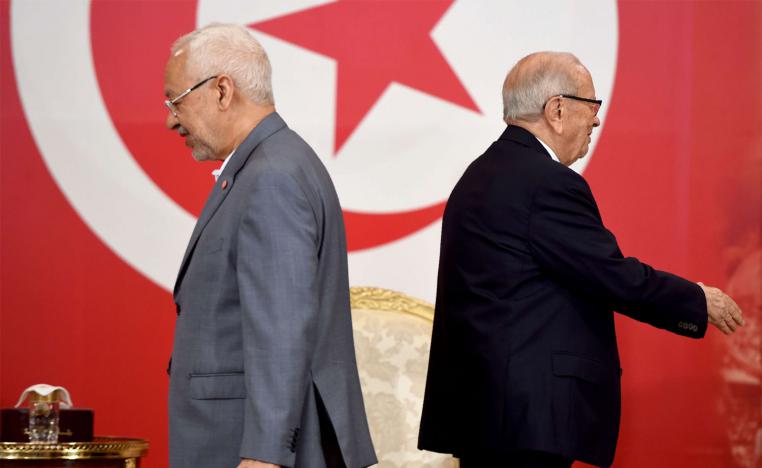 Tunisian President Beji Caid Essebsi (R) and Tunisian leader of Islamist Ennahdha party Rached Ghannouchi 