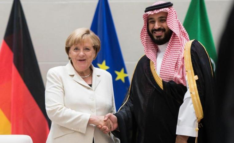 German Chancellor Angela Merkel shaking hands with Saudi Crown Prince Mohammed bin Salman 